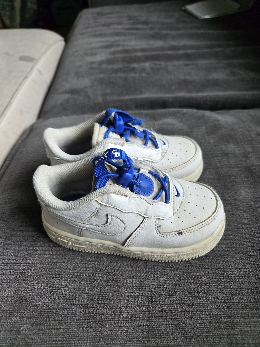 Nike Kids White Sneakers with Blue Accents